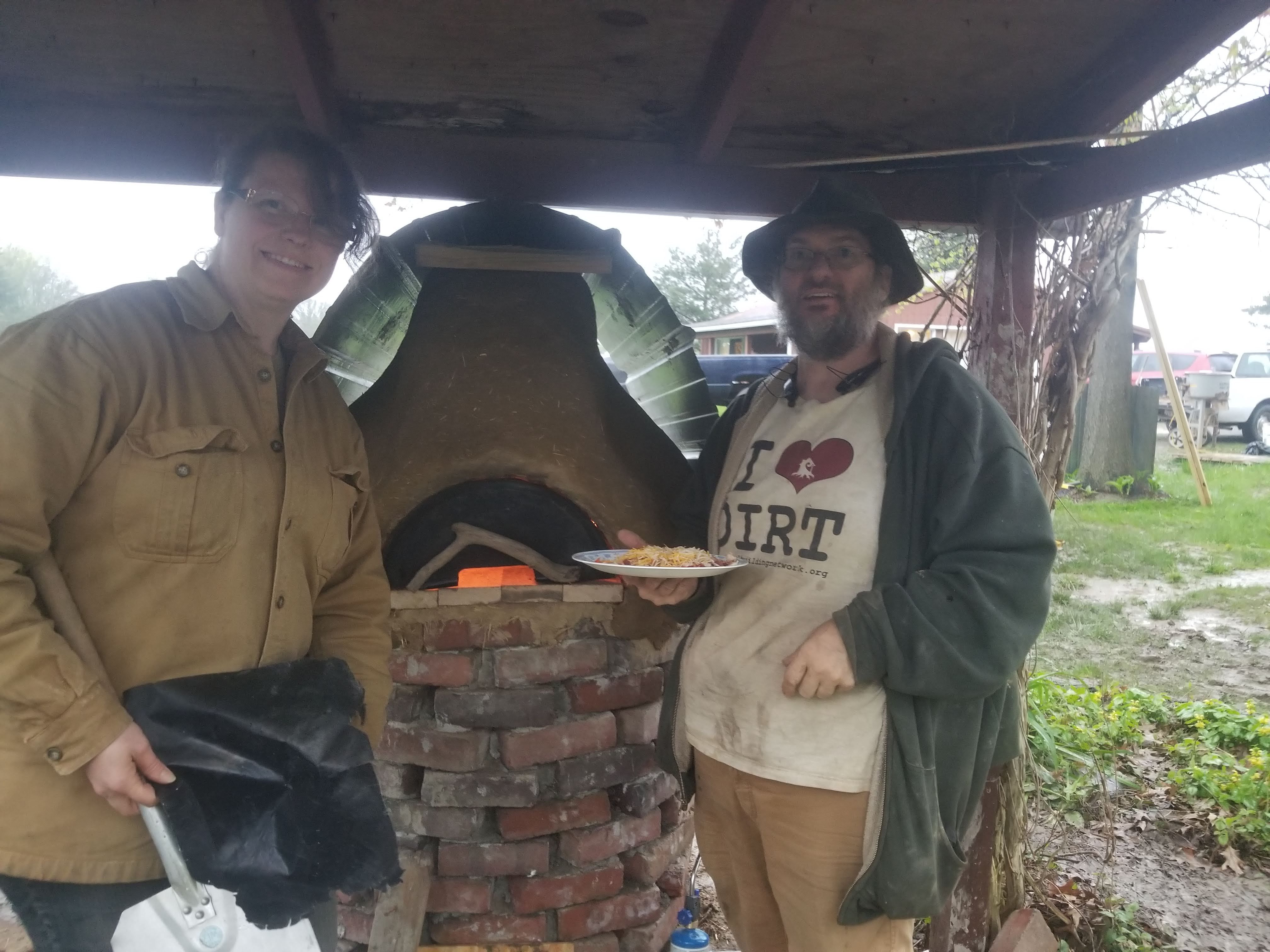 Pizza right out of the earthen cob oven
