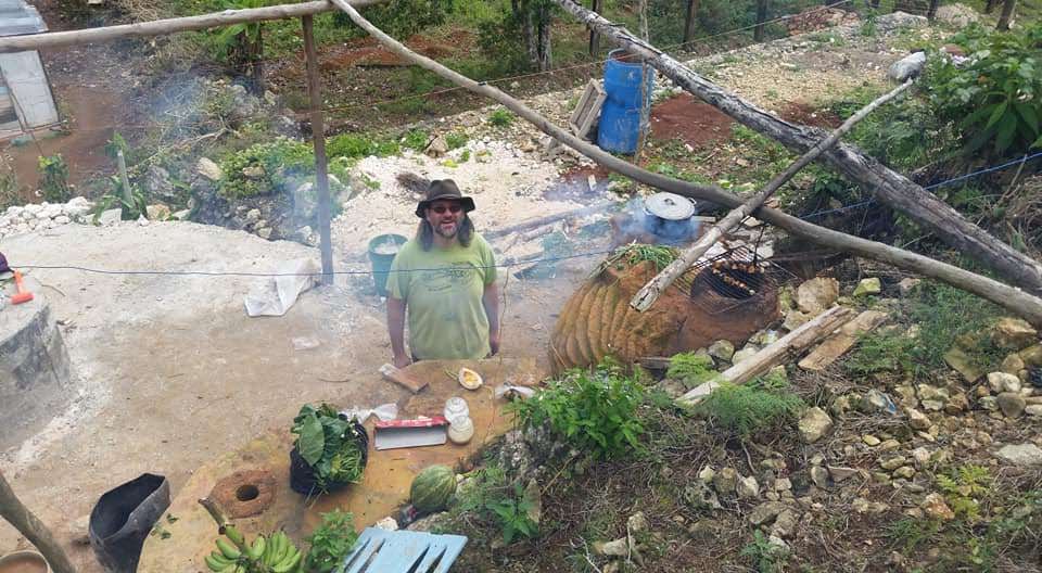 Uncle Mud in the Cob and Stone Outdoor Kitchen